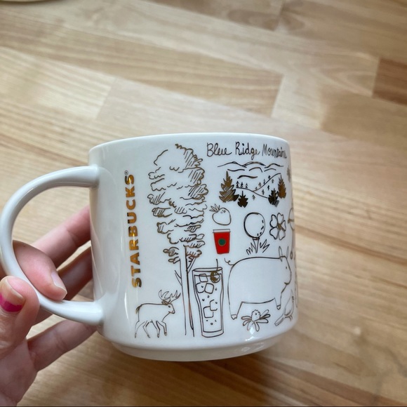 Starbucks | gold and red North Carolina mug
